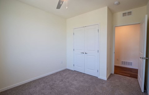 Dominium_Aviara Flats_40 - Vacant 3 BR Apt Bedroom 1 with Closet_Web(2)